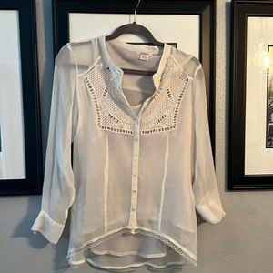 Sundance silk sheer cream top with cream tank under.